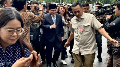 Rangkap Jabatan Menpora dan Ketua PSSI, Erick Thohir Lempar Bola ke FIFA